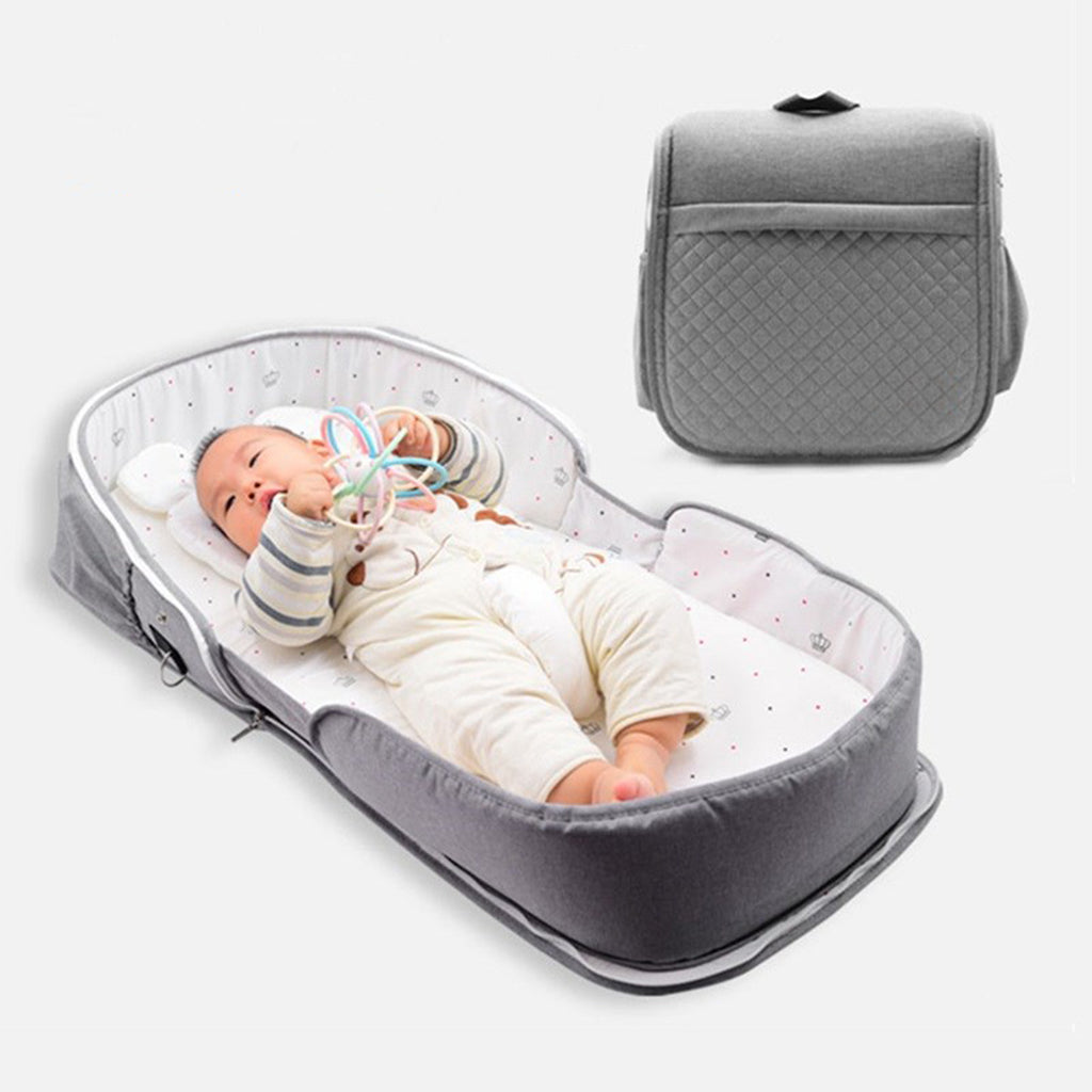 Crib middle bed newborn crib folding portable bionic bed mummy bag backpack